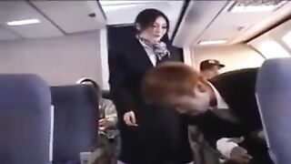 Japanese Stewardess Lends A Hand