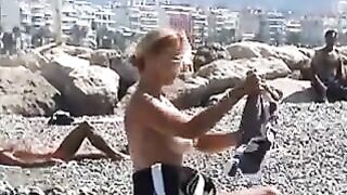 Beautiful Milf Undressing On The Beach