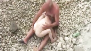 Couple At Nude Beach